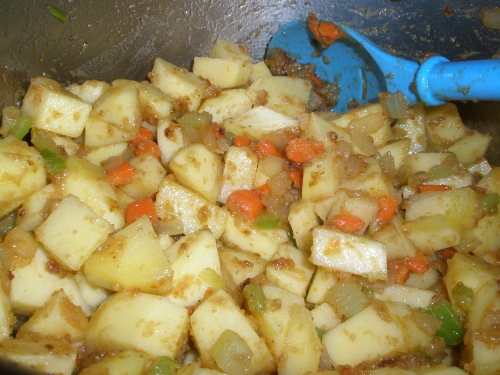 add the diced potatoes. cook and stir for  4-5 minutes. 