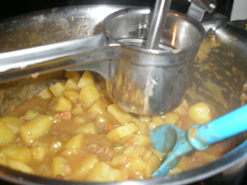 With a potato ricer, mash about 3-4 cups worth of the potatoes. This gives the soup a thicker and creamier texture. 