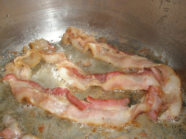 cook all bacon until crisp. Do not drain bacon fat. Once all bacon is done, set bacon on paper towels. This will be the garnish.