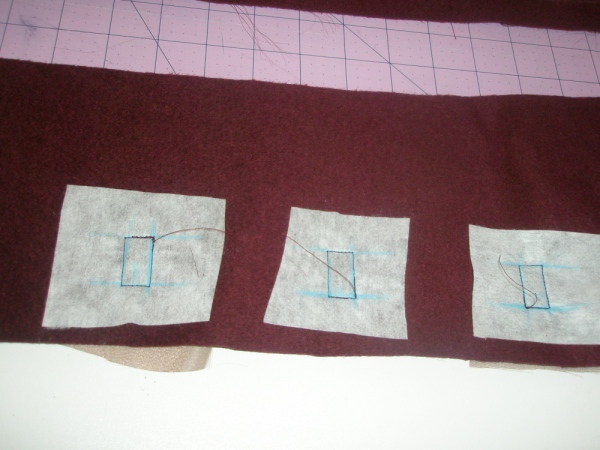 apply interfacing on wrong side, organdy on right side. Measure, draw and stitch rectangles that will become openings -- windows for buttonholes