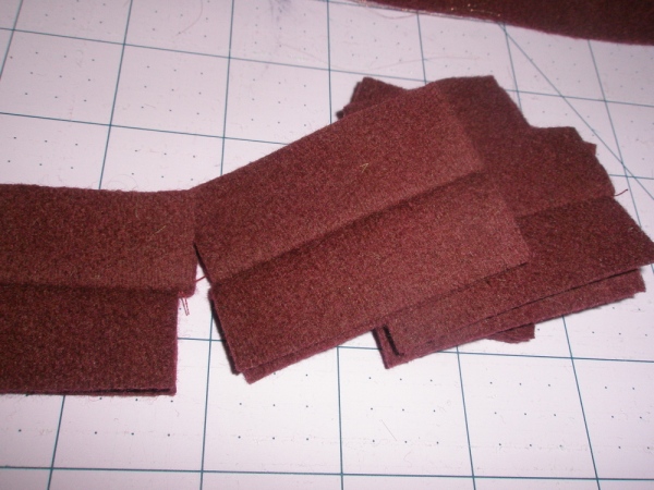 cut rectangles 2 by 1.5 inches, 2 for each buttonhole. RST sew two together with a long basting stitch, right down the center. Open and press so that right sides are showing